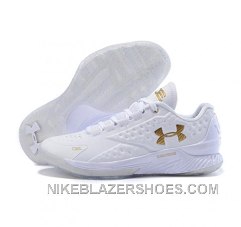 gold and white under armour shoes