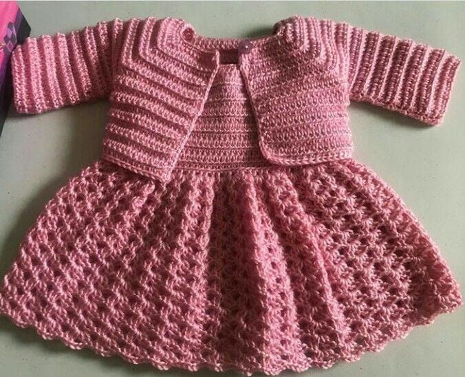 free crocheted baby clothes ideas for beginners We provide you with the latest and best crochet patterns for your baby girl. With new designs being added all the time, we will be sure to have one for your little princess Crochet Baby Dress Free Pattern, Baby Cardigan Knitting Pattern Free, Crochet Baby Girl Dress, Baby Girl Crochet, Crochet Baby Clothes, Baby Knitting Patterns, Crochet Dress, Baby Girl Frocks, Frocks For Girls