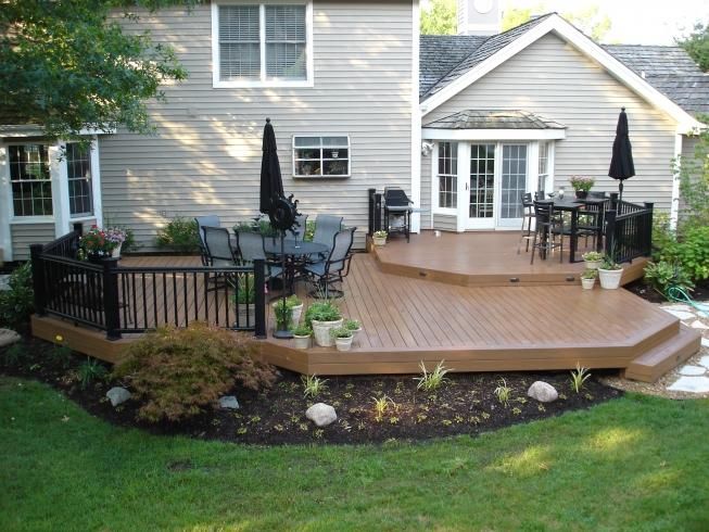 after ground level timbertech deck with timbertech railing and