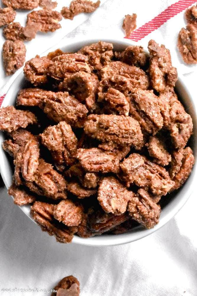 An easy gift for the holidays, or as a snack for guests! Sweet and flavored with cinnamon and sugar, these candied pecans are an addicting snack that's perfect for a crowd. | easy candied pecans | cinnamon sugar pecans | glazed pecans recipe | sugared pecans | praline pecans | candied nuts | roasted pecans | stress baking recipes | stressbaking.com #stressbaking @stressbaking #pecans #snack #holidays #cinnamonsugar Cinnamon Roasted Pecans, Roasted Pecans Recipe, Cinnamon Sugar Pecans, Spiced Pecans, Cinnamon Pecans Recipe Easy, Praline Pecans Recipe, Pecan Recipes Easy, Nut Recipes, Candy Recipes