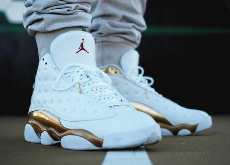 gold and white jordans 13