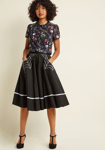 your style moods can change with the tides but your love for quirky choices like this black skirt is everlasting featuring white trim and pockets upon