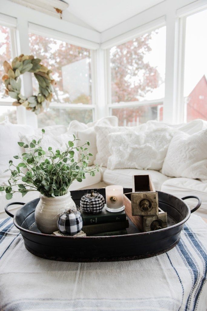 Farmhouse style coffee table in the sunroom - A lovely warm wood style coffee table style with a tablecloth on top to cozy it up. A great source for farmhouse & cottage style home decor! Easy Home Decor, Home Decor Kitchen, Home Decor Styles, Home Decor Accessories, Country Kitchen, Kitchen Ideas, Sunroom Decorating, Decorating Bookshelves, Decorating Coffee Tables