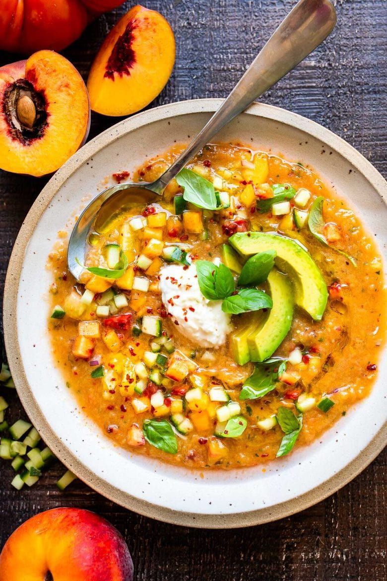 Tomato Peach Gazpacho with Basil and Burrata -a chilled summer soup that is cooling and refreshing and easy to whip up. Vegan-adaptable! #gazpacho #peachrecipes #tomatorecipes #summerrecipes #chilledsoup Whole Food Recipes, Cooking Recipes, Healthy Recipes, Healthy Bowls, Healthy Soup, Fruit Recipes, Delicious Recipes, Easy Recipes, Chilled Soup Recipes