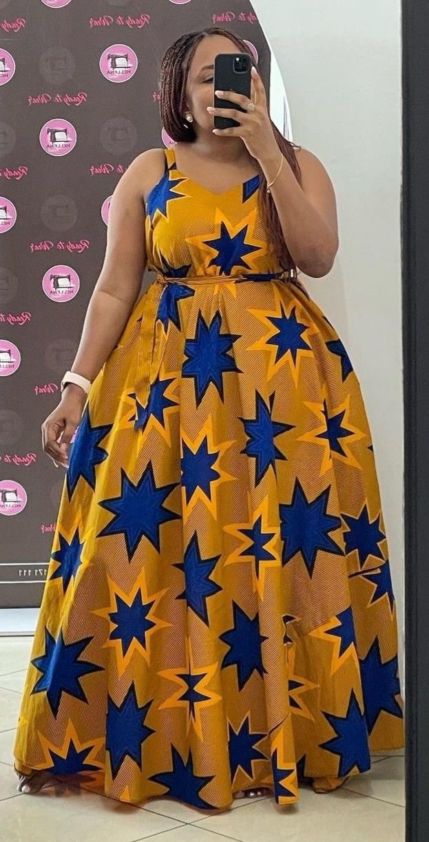 What else do you need more than this elegant African Print that ambiprooffashion offers you? Size: All sizes. Your vivid measurements will be taken. Goek/Head gear: For free Quick delivery. Front and back are shown Anyone can wear it African Dresses Modern, African Maxi Dresses, Latest African Fashion Dresses, African Dresses For Women, African Attire, African Fashion Traditional, African Fashion Modern, African Print Dress Designs, African Print Skirt