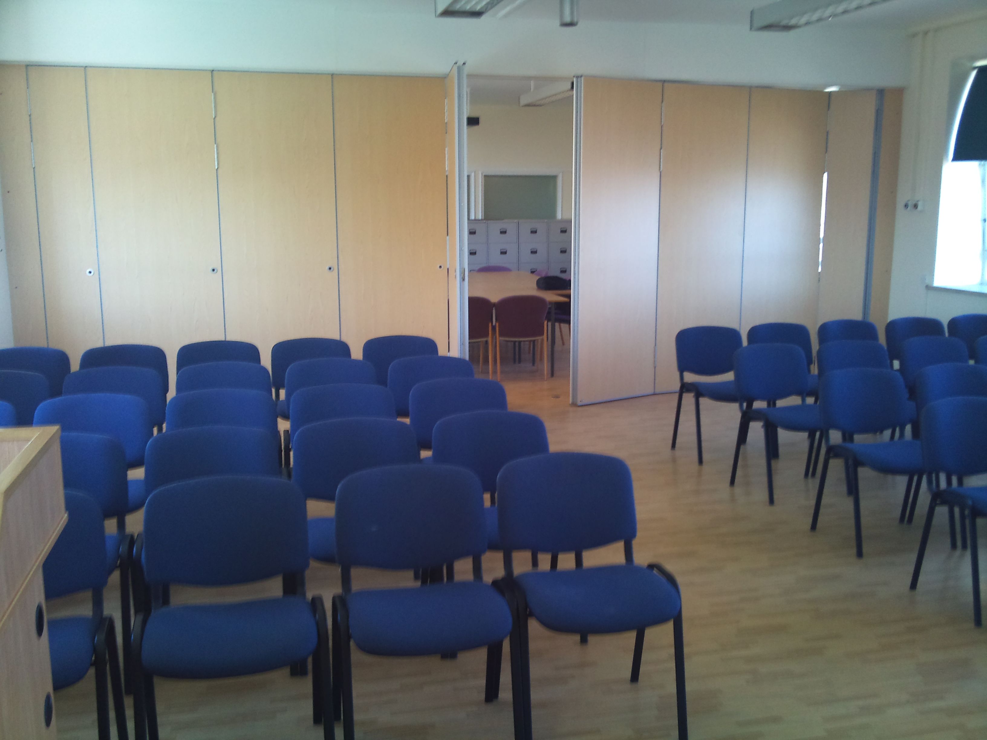 Sliding folding partition, sliding wall with pass door, installed in a hospital ...