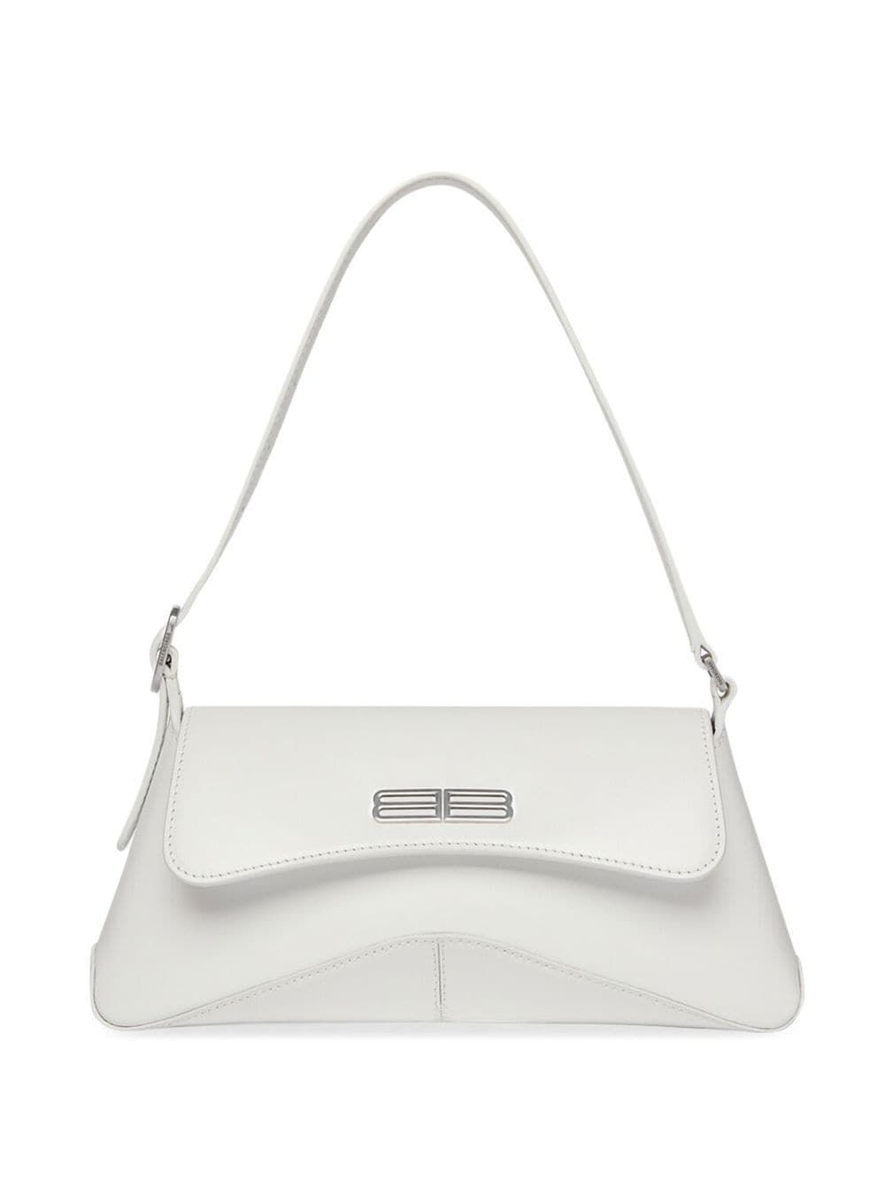 XX Small Flap shoulder bag from BALENCIAGA featuring optical white, calf leather, foldover top with magnetic fastening, silver-tone hardware and internal slip pocket. | Balenciaga XX Small Flap shoulder bag Balenciaga Bag, White Balenciaga, Smooth Leather, Calf Leather, White Backpack, I'm With The Band, Wallet Pouch, Pretty Bags, Cross Bag