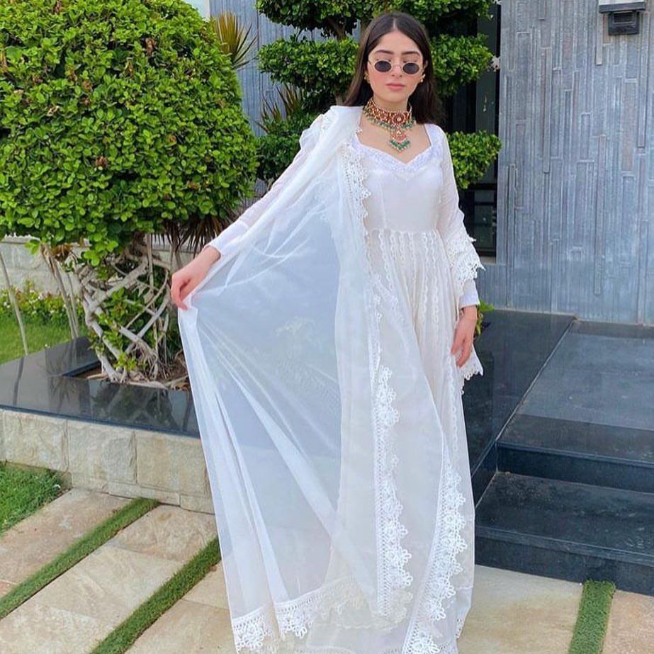 A vision in white caught in a candid moment. Loving the floor length white pishwas paired with a statement necklace. Order now at… Desi Wear, Indian Attire, Order Now, Hijab Fashion, Candid, Floor Length, White Dress, Pairs, In This Moment