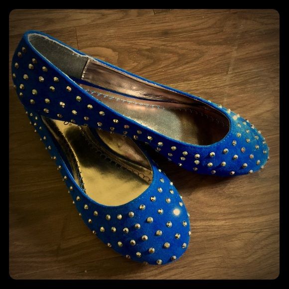 white and blue flats
