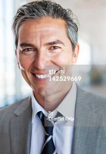 Portrait Of Relaxed Casual Business Man Smiling Corporate