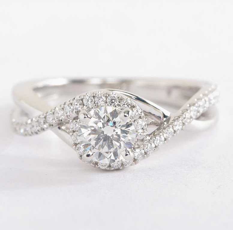 Classic with a twist, this 14k white gold engagement ring by Blue Nile features a delicate twist of pavé-set diamonds that will complement the center diamond of your choice. 14k White Gold Engagement Rings, Classic Engagement Rings, Beautiful Engagement Rings, Wedding Rings Unique, Halo Diamond Engagement Ring, White Gold Rings, Unique Rings, Diamond Ring, Center Diamond