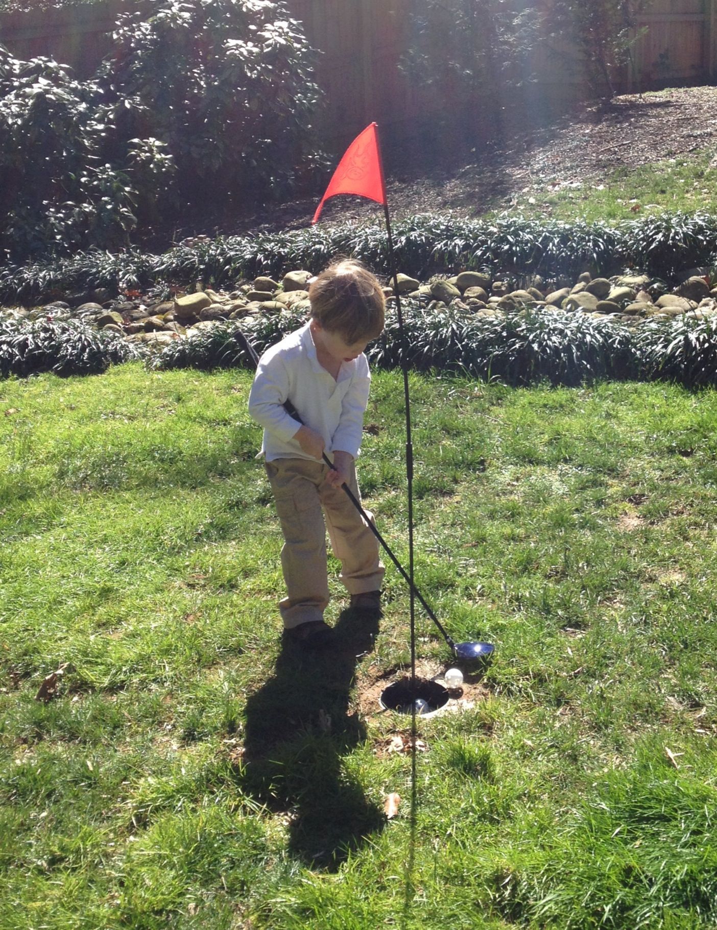 Backyard Golf Hole- Cut A Plastic Pipe From Hardware Store. Dig Backyard Golf Hole- cut a plastic pipe from hardware store. Dig small hole and fill with sand. Insert flag of your choice. Wa-la! - Backyard Golf Hole- Cut A Plastic Pipe From Hardware Store. Dig
