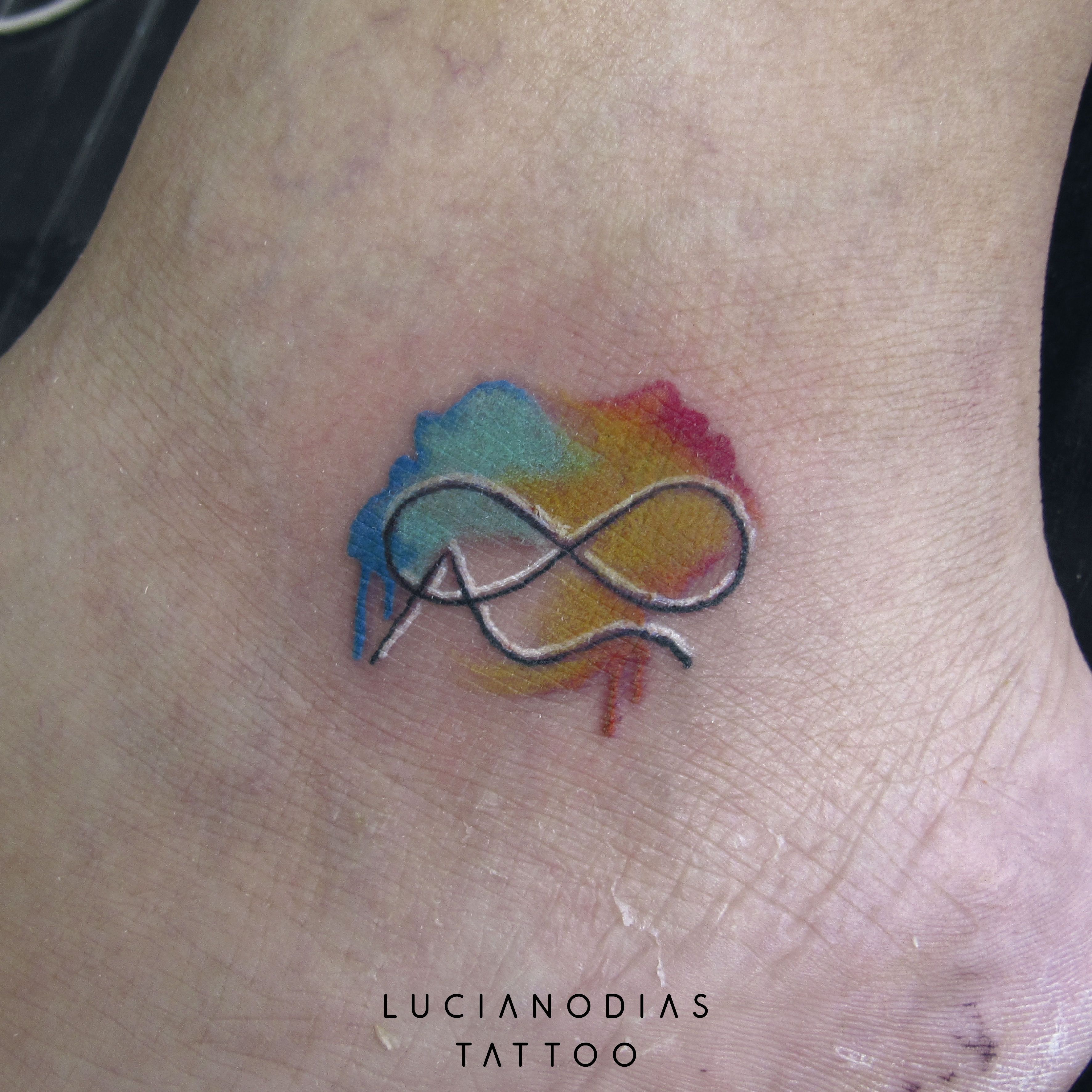 Watercolor infinity symbol with stylized letter A made by me at the