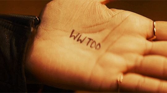WWTDD written in ink on the hand of Yasmin Khan.