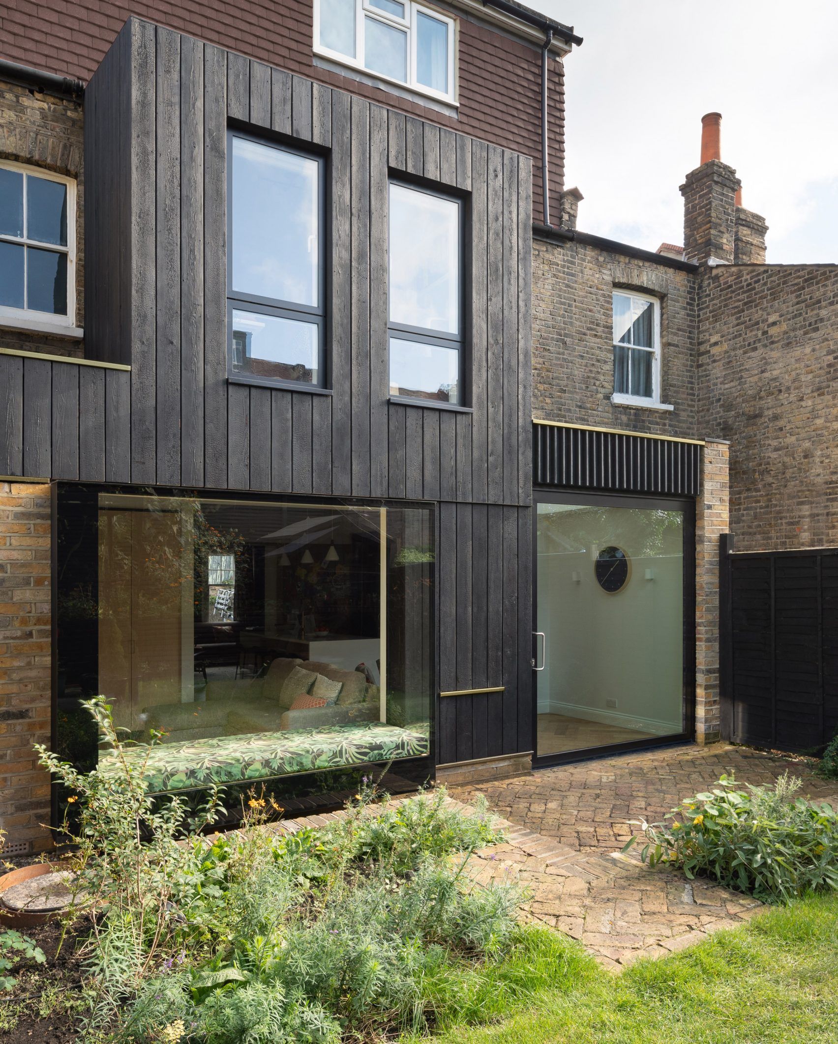 Victorian townhouse in London remodelled with charred-wood extension