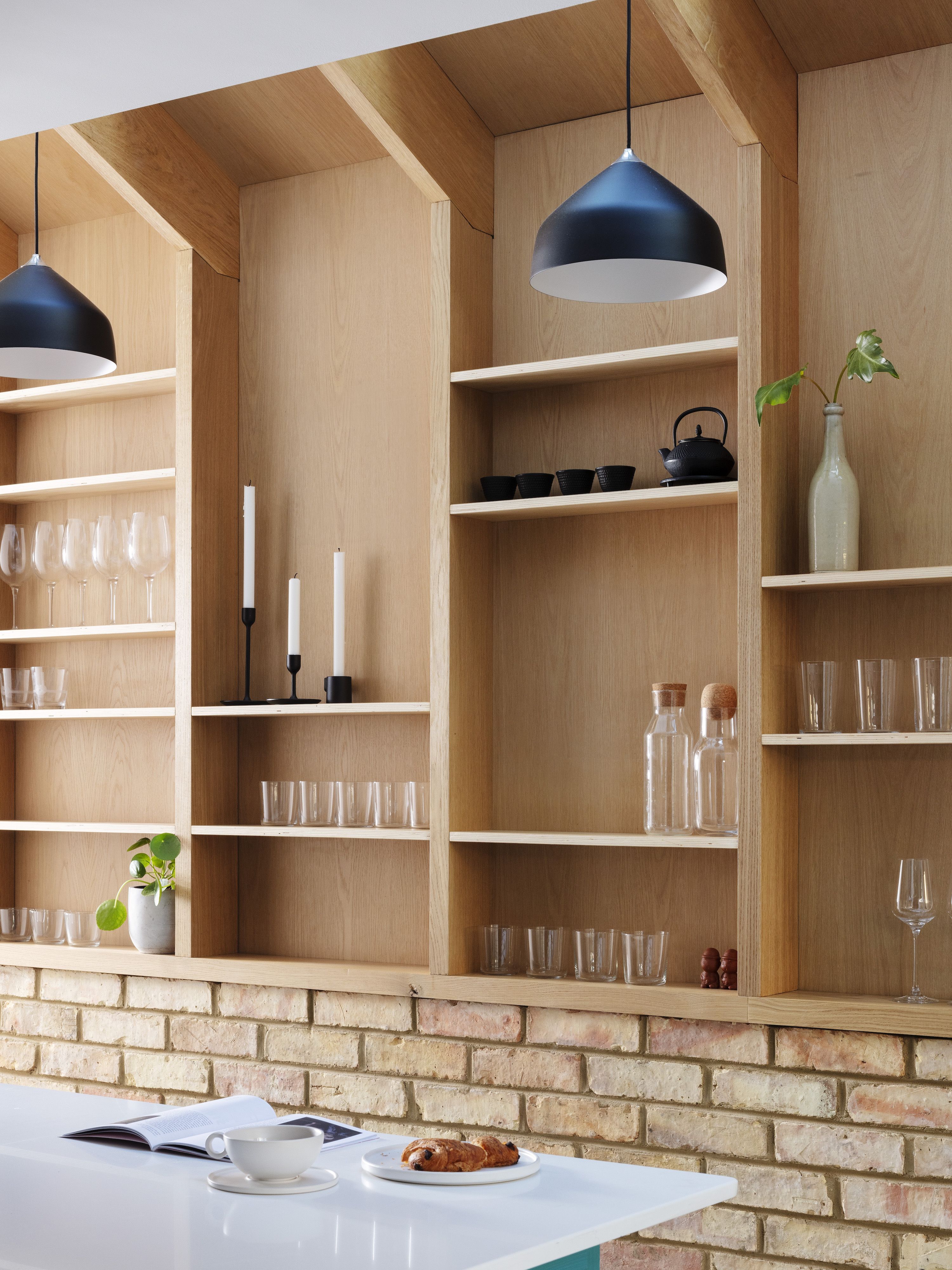 Photographer: Rory Gardiner Almington Street House//Amos Goldreich Architecture The brief was to enlarge the kitchen with a side extension and make more space on the ground floor with efficient storage solutions throughout. This project offered the opportunity to bring so much creative thinking to the table – we wanted to create something homely, functional, and family-orientated... Brick Extension, Side Extension, Extension Ideas, Kitchen Extension Terraced House, Victorian Terrace House, Cabinet D Architecture, Pantry Wall, Modern Victorian, Street House