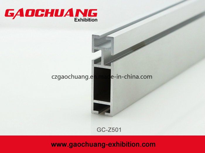 Aluminum Octanorm Exhibition Booth Stand Beam Extrusion (GC-Z501) Display Products : Jewelry, Exhibition Booth. Material : Metal. Display Place : Indoor. Usage : Exhibition Show, Speciality Stores, Supermarkets and Stores, Home. Antitheft : Not Antitheft. Groove Channel : 4.3mm. Powder Coating : Available. Length : 6m, or Customized. Size : 50X16mm. Hardware Material : Aluminum Alloy. Color : Silver Anodized. Customized Production : Yes. Package : Carton Box. Aluminum Code : 6063, T5. Metal Display, Display Stand, Exhibition Booth, Carton Box, Extrusion, T5, Powder Coating, Groove, Aluminium Alloy