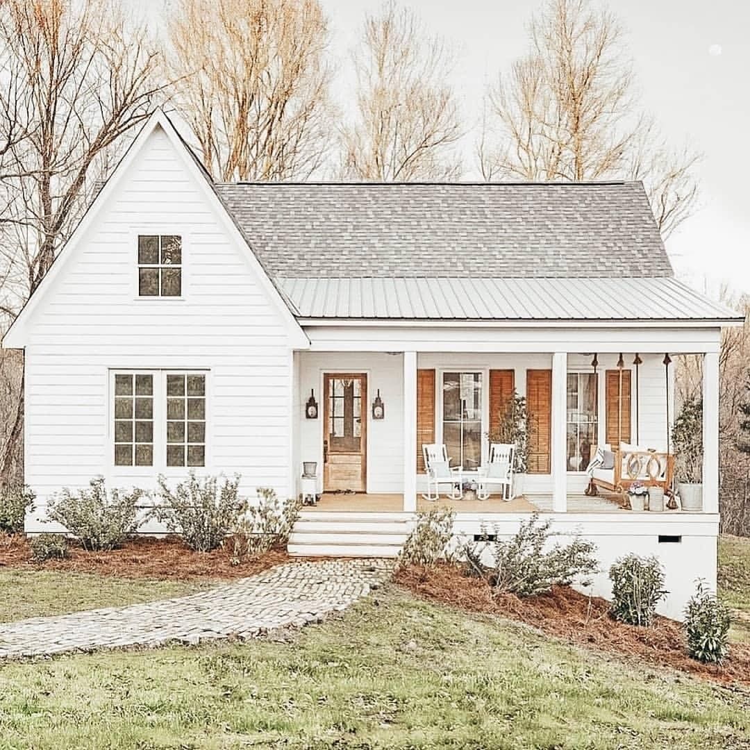 Farmhouse Is My Style on Instagram: “Charming white farmhouse with rich, amber colored wood shutters, matching front door and porch swing. Sweet tea anyone? (📷credit…” - fashioncold.com/interior