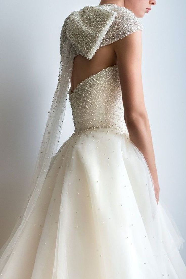2022 Wedding Dress Trends Pearl Bridal Gown by Allison Webb. Romantic Strapless ball gown with giant bow in the back and shoulder cover up for a fairytale event - Belle The Magazine | See more gorgeous bridal gowns by clicking on the photo Wedding Cake Pearls, Pearl Wedding Dress, Wedding Dress Trends, Bridal Pearls, Designer Wedding Dresses, Bridal Dresses, Wedding Dresses Lace, Bridal Gown, Pearl Bridal