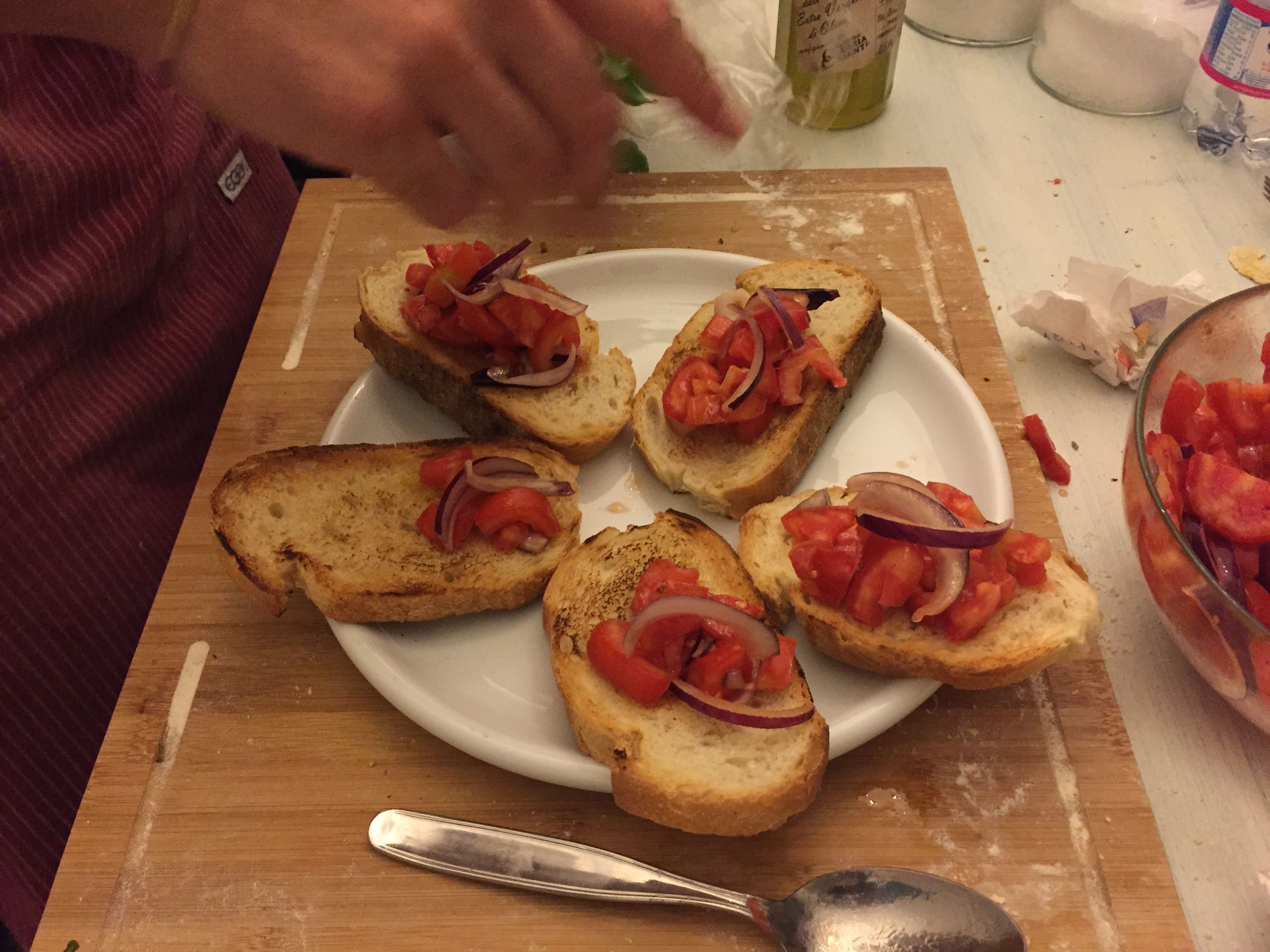 Typical Italian bruschetta. Toasted bread with tomatoes Typical Italian bruschetta. Toasted bread with tomatoes