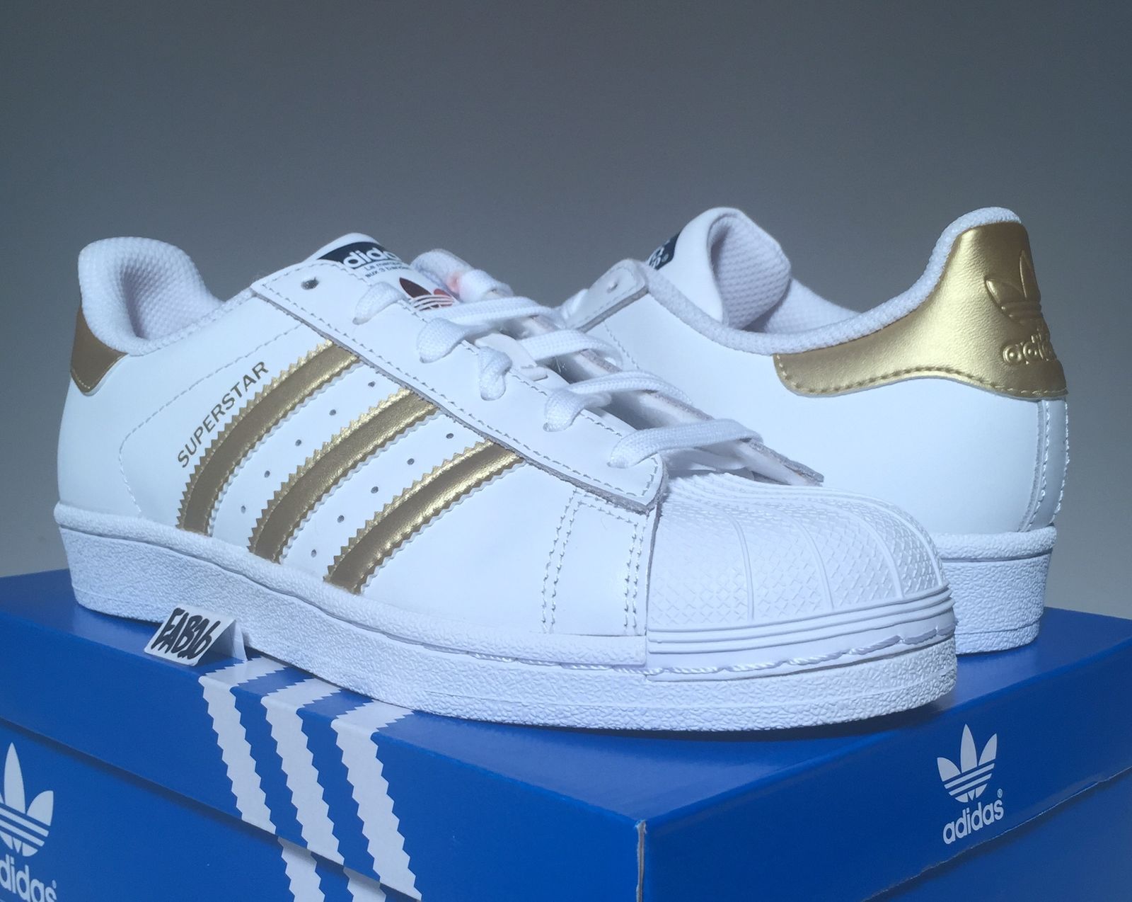 adidas superstars black white and gold junior adidas superstars black white and gold junior
