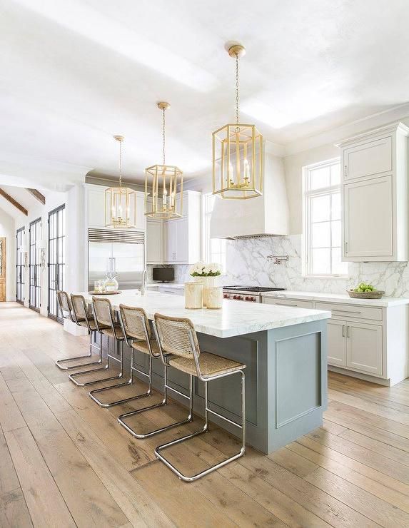 Three Gold Hexagon Lanterns Illuminate A Long Gray Kitchen Island Adorable Kitchen Lanterns 2018 Three Gold Hexagon Lanterns Illuminate A Long Gray Kitchen Island Inspiration Kitchen Lanterns Inspiration Design