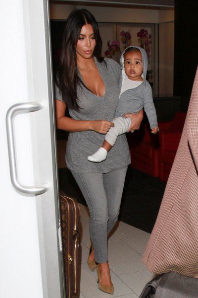 Kim and North Wore Matching Travel Outfits Kim and Kim and North Wore Matching Travel Outfits Kim and