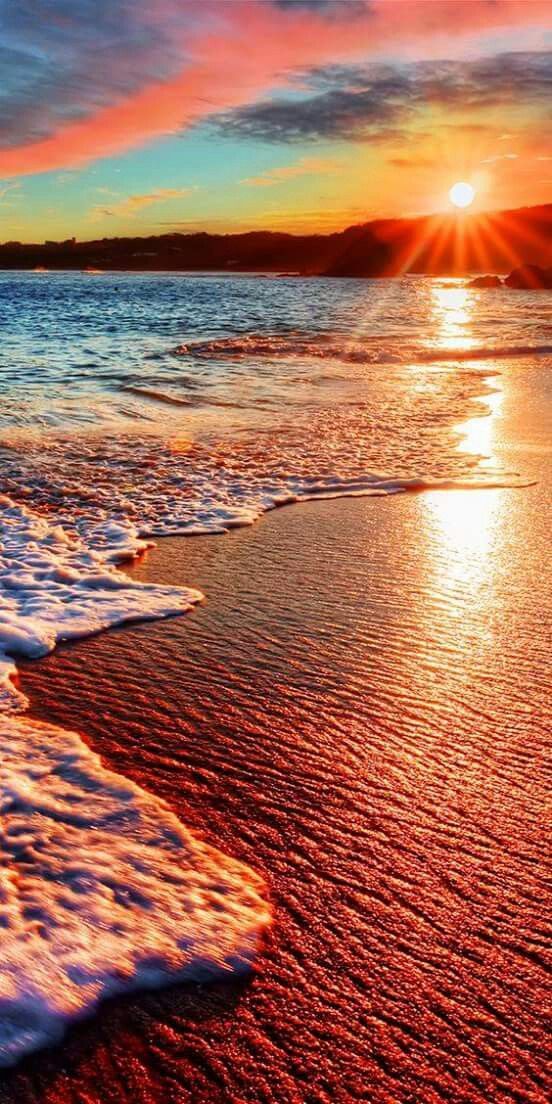 Brilliant vacation destination beach sunrise with colorful sand...