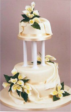 Calla Lilly Wedding Cake Cakes Pinterest Lilies Calla Lilies Wedding Cake Decorations Love The Poles Maybe A Little Shorter Likes Creme Color Flowers And Fondant Layered On Lie Fabric