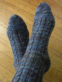 Pattern Description from Interweave Knits, Fall 2005: “Nancy Bush has designed these classic socks to celebrate her upcoming book Knitting Vintage Socks (Interweave Press, 2005), a collection inspired by projects in Weldon’s Practical Needlework newsletters published in Great Britain between 1886 and the end of the 1920s. Many of the men’s socks and stockings of the time, like the ones featured here, used ribbing and cable patterns. Nancy derived this pair from one called Gentleman’s Bicycle ... Knitting Patterns Free Blanket, Sock Patterns, Easy Knitting, Knitting Stitches, Knitting Socks, Cable Knitting, Cable Knit Socks, Hand Knit Socks, Crochet Socks