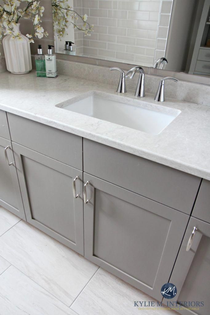 Bathroom vanity painted Metropolis Benjamin Moore gray. Caesarstone Bianco Drift greige quartz countertop, Moen Glyde faucet and porcelain tile flooring by Kylie M Interiors #bathroomcolor Bathroom Tile Designs, Bathroom Floor Tiles, Painting Bathroom, Bathroom Colors, Diy Bathroom, Bathroom Interior, Modern Bathroom, Bathroom Gray, Bathroom Inspo