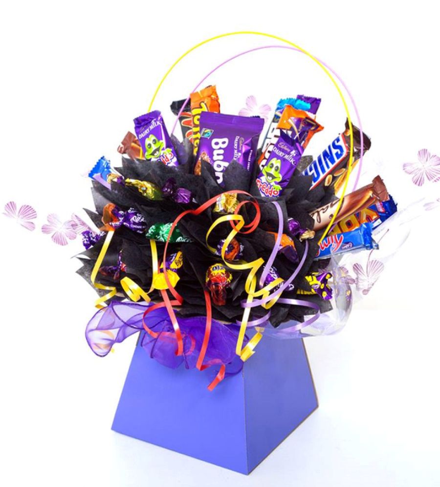 We make ourselves unique bouquets of chocolates with our own hands as a gift We make ourselves unique bouquets of chocolates with our own hands as a gift