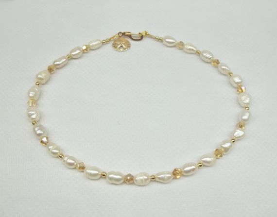 Gold Sand Dollar Anklet Pearl Anklet Gold Crystal Anklet Etsy In 2021 Crystal Anklet Pearl Ankle Bracelet Pearl Anklet
