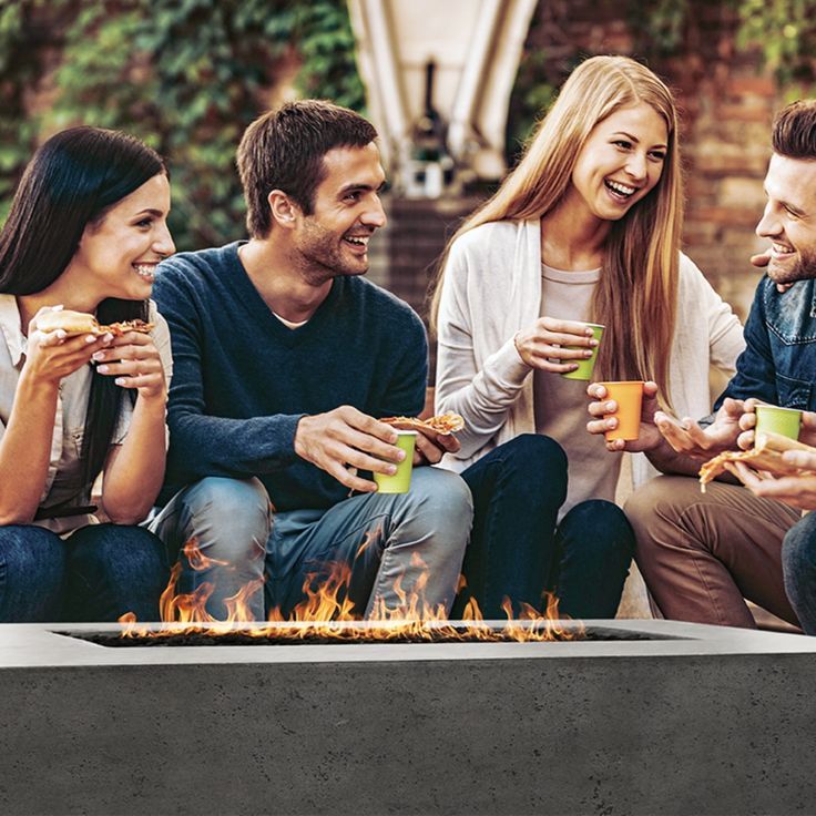 Take advantage of the evening light by gathering your family and friends around your outdoor fireplace. Let us help you with the materials to build your backyard oasis today. 📷 Prism Hardscapes