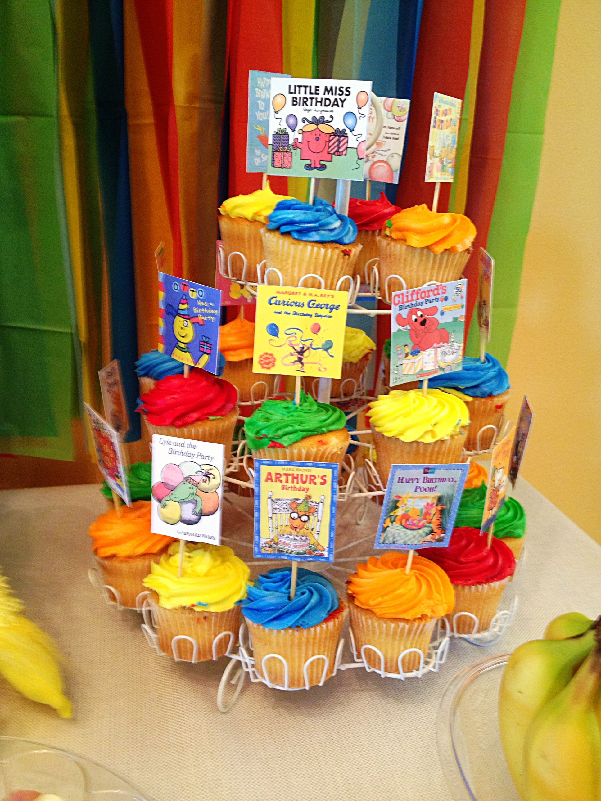 I used 4 inch skewers and printed book covers off of the internet...because they were on a round display, I made them double sided. At first it was overwhelming deciding which books to pick but then I decided since it was a birthday party, I would do all birthday, cake, party, etc themed books. If you were doing a picture book themed baby shower this would be a really cute idea too but using new baby themed books... Baby Shower Cakes Neutral, Baby Shower Cake Pops, Baby Shower Cakes For Boys, Twins Baby Shower, Baby Shower Cookies, Book Themed Birthday Party, Baby First Birthday Cake, Cupcake Birthday Party, Themed Parties