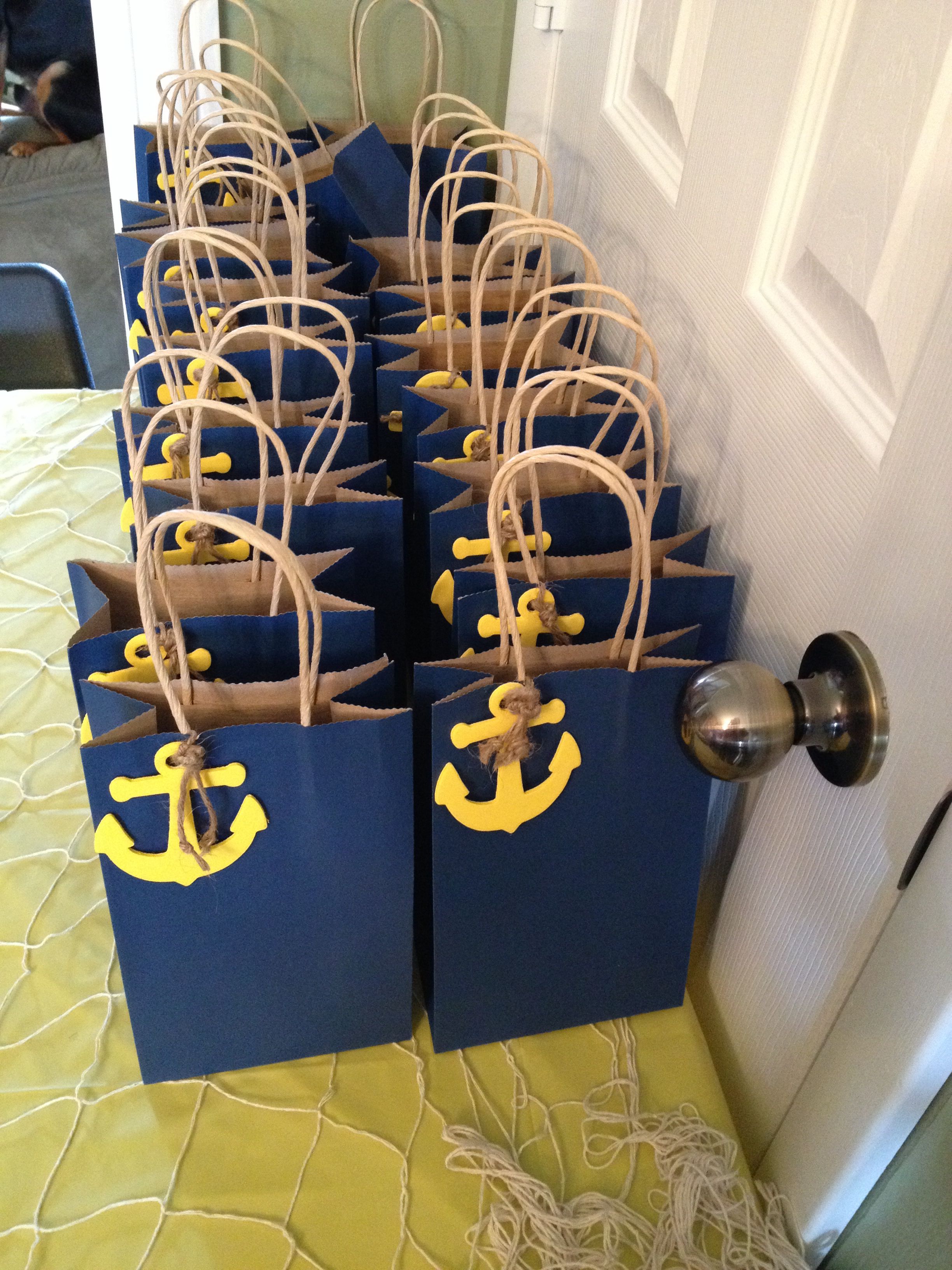 Found these wooden anchors & twine at Michaels Craft Store. Painted anchors yellow and tied twine like rope knot. Jake pirate colored goody bags. Found 3-pack bags at Dollar Tree store. The kids loaded up on Pirate Grub after the party and brought around to all the Treasure Map Game stations. Sailor Baby Showers, Sailor Theme Baby Shower, Sailor Party, Kids Birthday, Birthday Party, Bday, Sailor Birthday, Cruise Party, Cruise Theme Parties