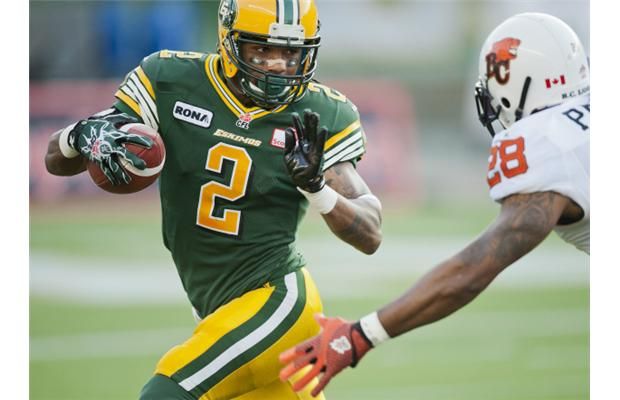 Edmonton Eskimos Fred Stamps 2 Doges Bc Lions Byron Parker During The First Quarter Of The Cfl Footb Thanksgiving Football Football Canadian Football League [ 400 x 620 Pixel ]