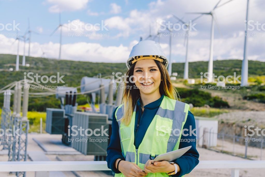 Portrait Of Young Happy Electrical Engineer And Technician Worker