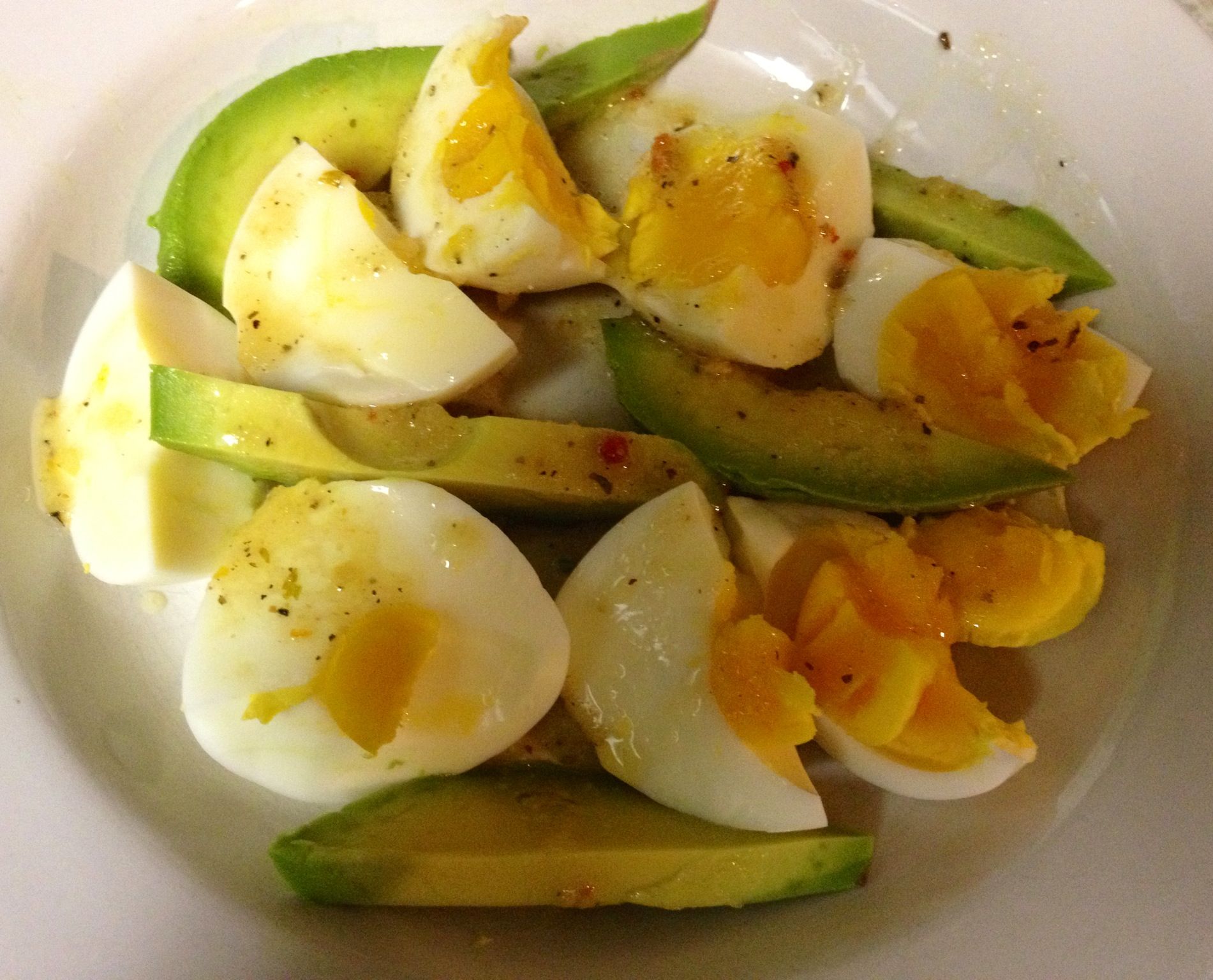 Quick and easy yummy breakfast. Soft boiled eggs and avocado dressed