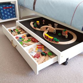 Underbed Play Table with Drawers -A brilliant play area as well as useful toy storage for bedrooms that are short on space. The table will fit under most beds and rolls out easily. The storage drawer is on castors so your kids can just wheel it out for easy access. Features: reversible top with blackboard on one side and white on the other, and jute rope handle. @Shelly Paice Toddler Bedrooms, Toddler Room, Bedroom Kids, Trendy Bedroom, Bedroom Small, Men Bedroom, Boys Bedroom Ideas Toddler Small, Boys Train Bedroom, Baby Boy Bedroom Ideas