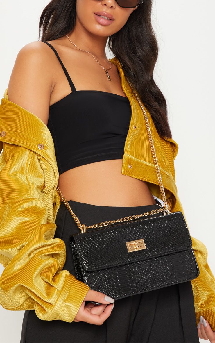 black cross body bag with gold chain