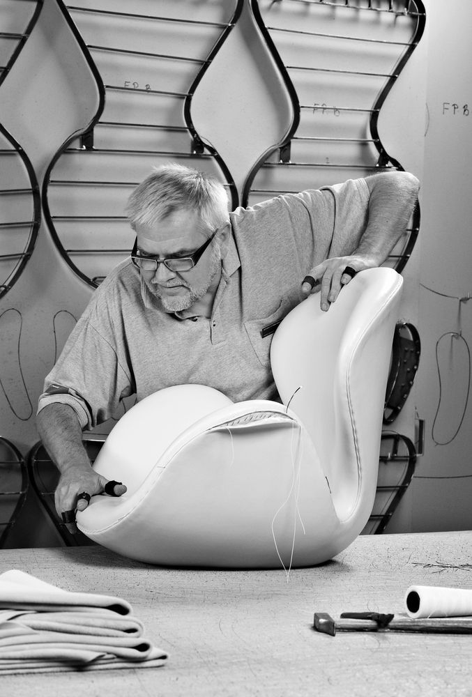 Renowned Danish designer Arne Jacobsen creating his famous Renowned Danish designer Arne Jacobsen creating his famous