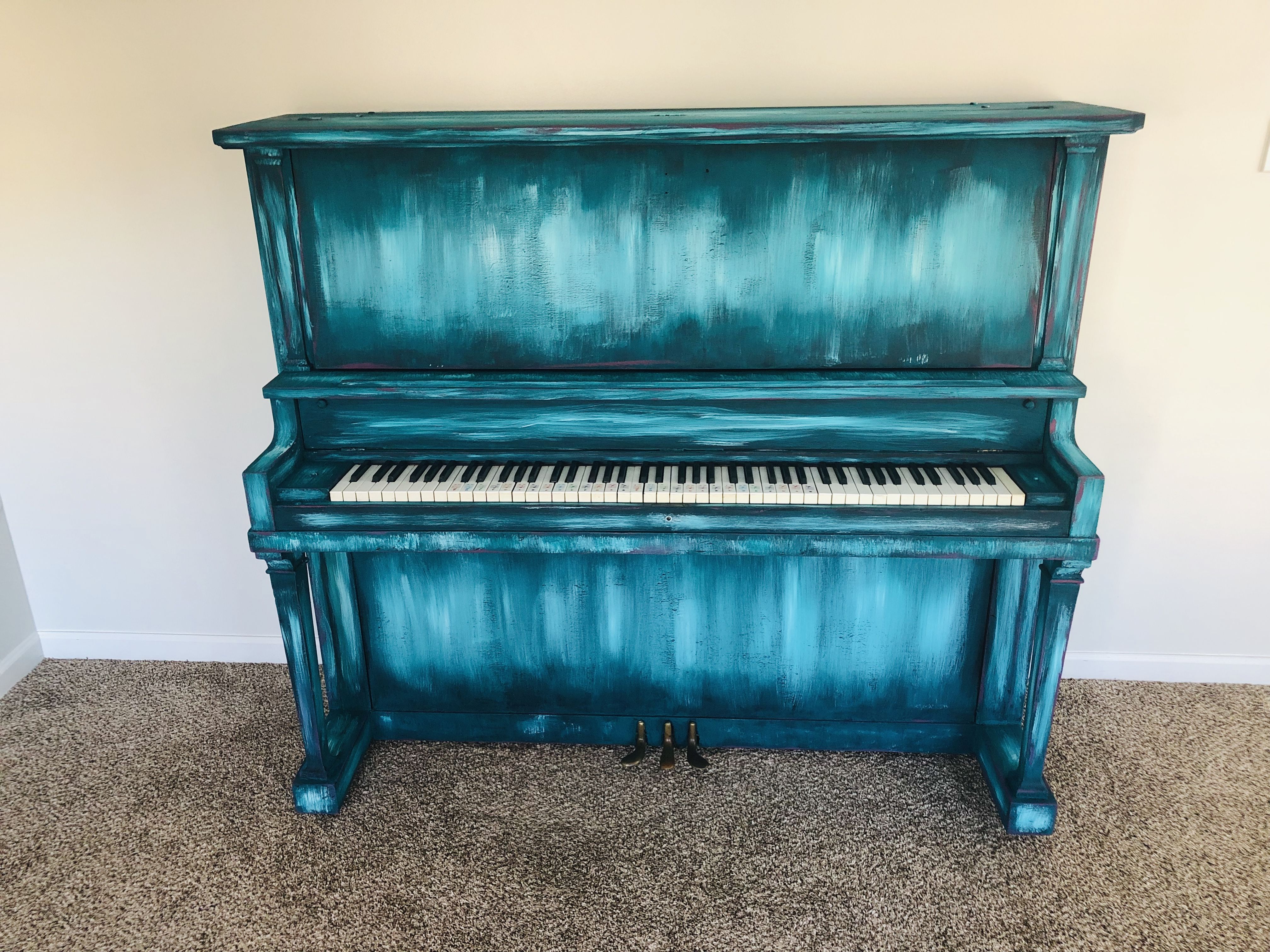 DIY painted piano using chalk paint from Valspar. I used teal which is called Ann’s Embroidery and white which is called Kid Gloves. You can buy the Valspar Chalky Paint at Lowe’s and they tint it for you. I also mixed a small amount of red and blue chalky paint from Michael’s to do the magenta accents. I taped plastic on the wall, around the ground, and on the keys to protect it all. I basically finished it in one day though! Next I will seal it with polyurethane. Beautiful, fun and vibrant! Valspar Chalky Paint, Dresser Inspiration, Painted Pianos, Using Chalk Paint, Kid Gloves, Furnitures, Diy Painting, Crib, Magenta