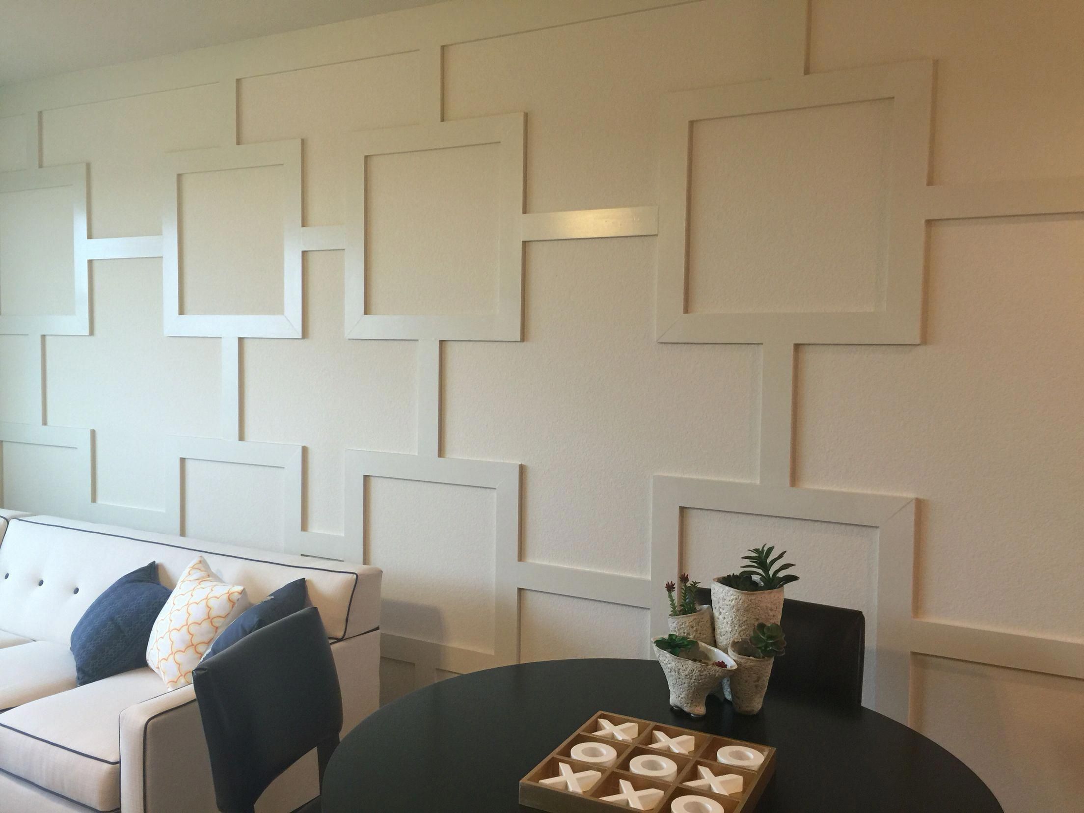 Wood trim design accent wall. Simply use 1x4's to add this look to any