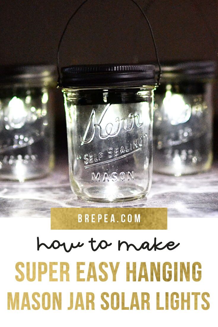 This is one of the best DIY solar lights ideas! This tutorial will show you how to make a hanging solar light out of a mason jar and solar light! You can find the supplies at the dollar store. These lights are perfect for backyards and along a fence. #backyards #solarlight #masonjar Mason Jar Solar Lights, Mason Jar Lighting, Jar Lights, Diy Lighting, Lantern Lights, Diy Solar, Solar Light Crafts, Solar Lamp, Solar Hanging Lanterns