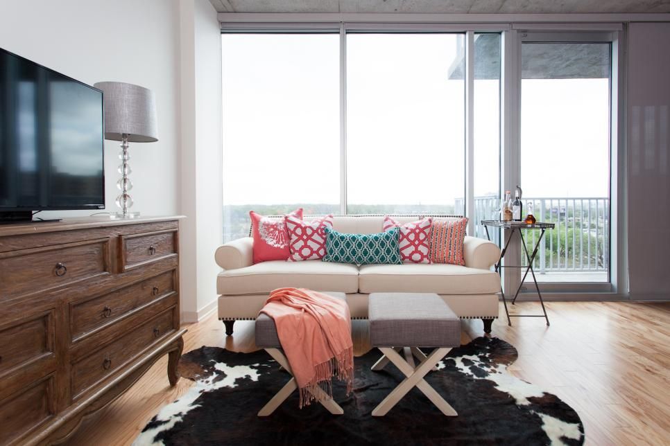 A cowhide rug strikes a rustic note in this eclectic living room ... A cowhide rug strikes a rustic note in this eclectic living room ...