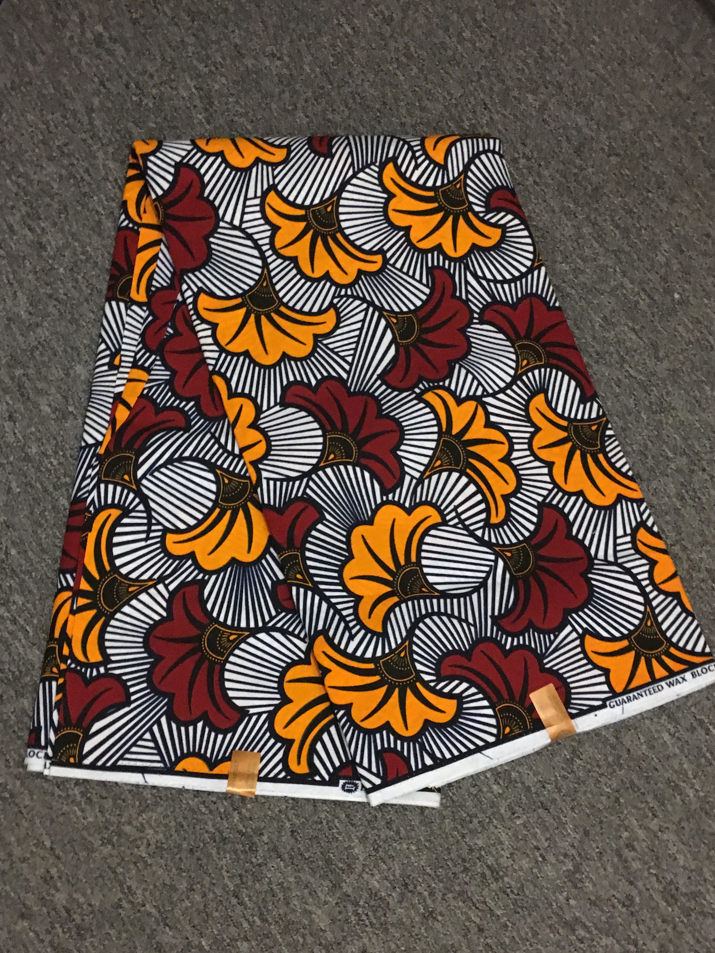 African print fabric / burgundy / marigold / black and white African print fabric / burgundy / marigold / black and white