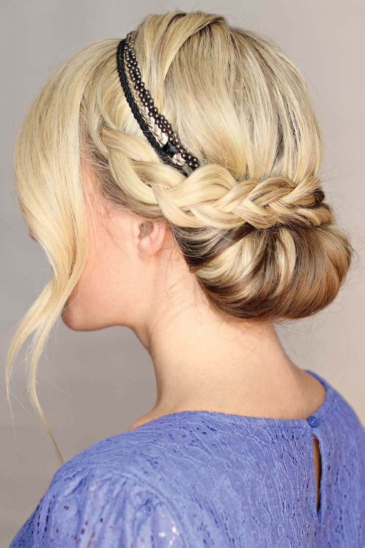 chignon tressé et frange sur le côté agrémentés d\u0027un headband