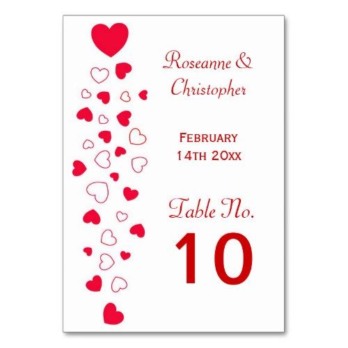 a table card with hearts on it and the number ten written in red