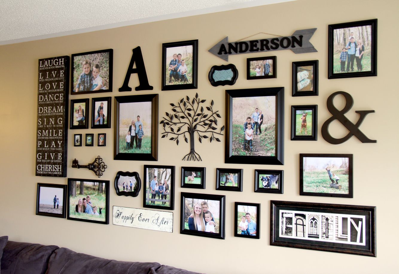 living room family photo gallery wall